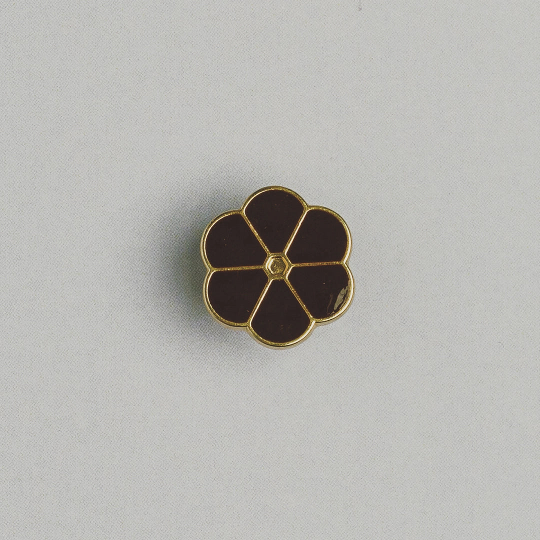 Blomknapp i metall med ögla