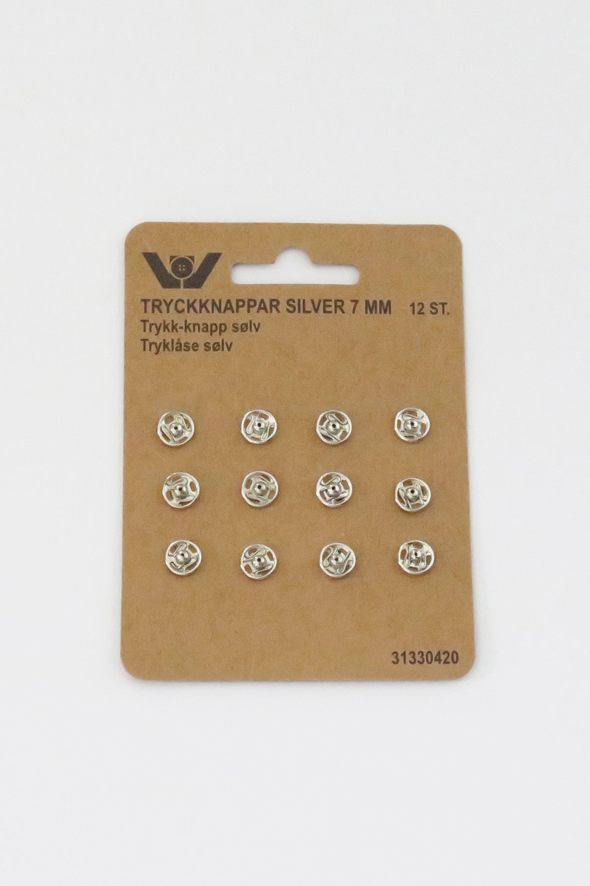 Button with four holes in olive wood