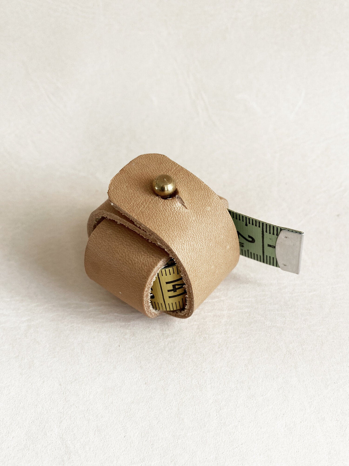 Askegren - Måttbandshållare