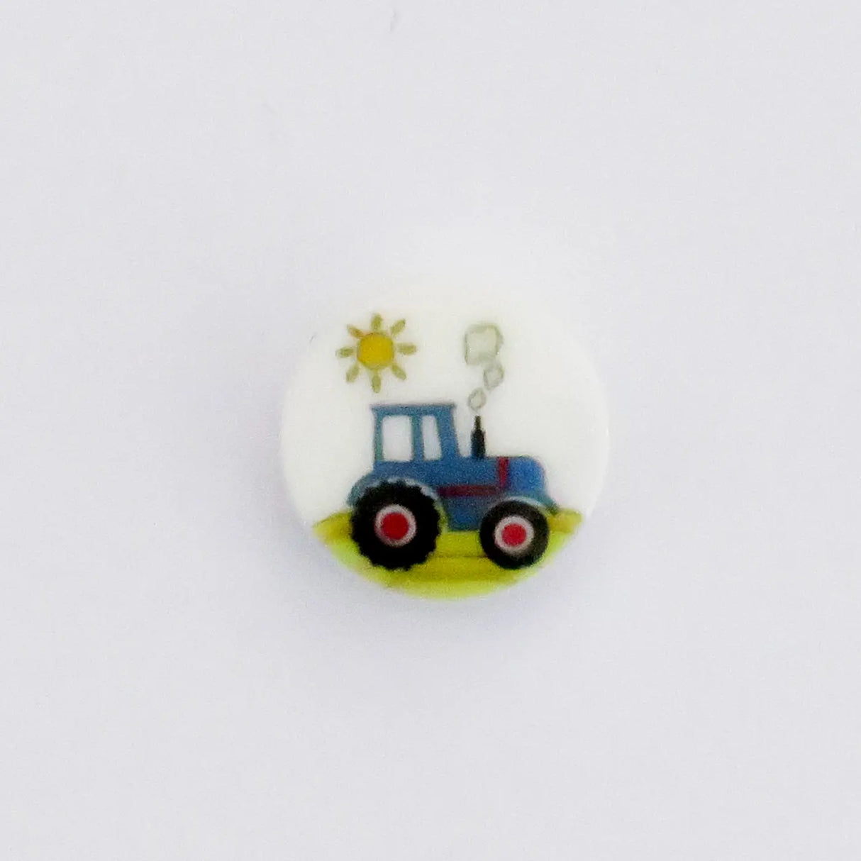 Button with tractor